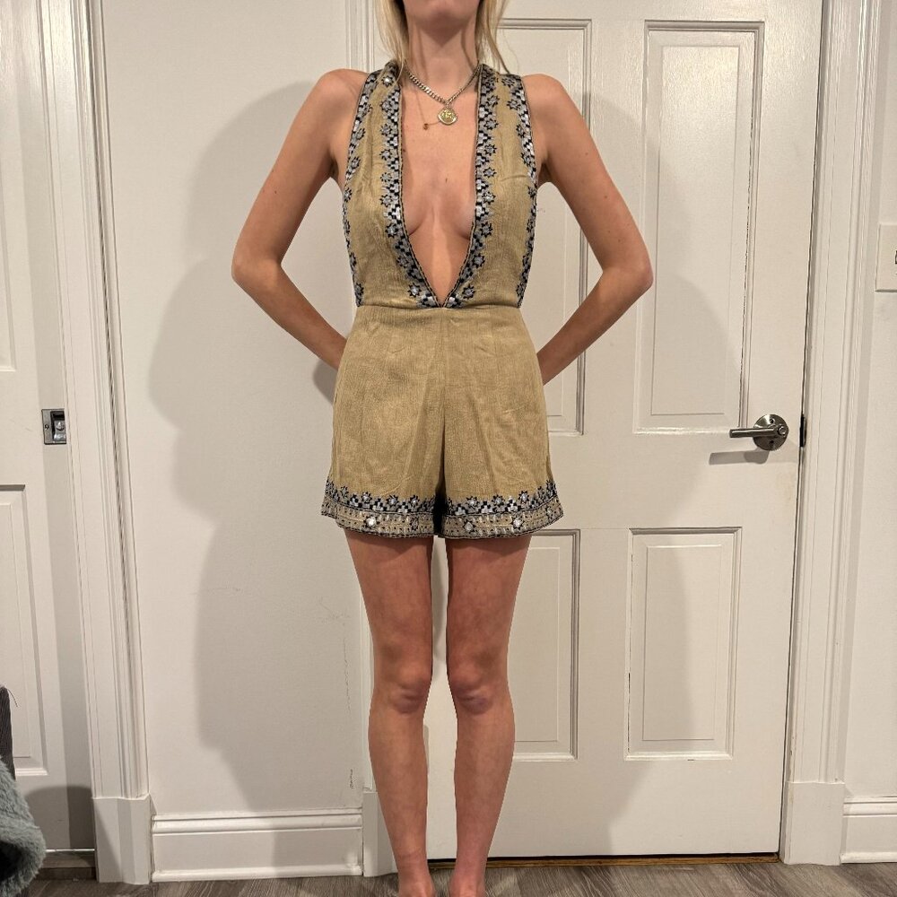 Free People Tan v-neck romper.